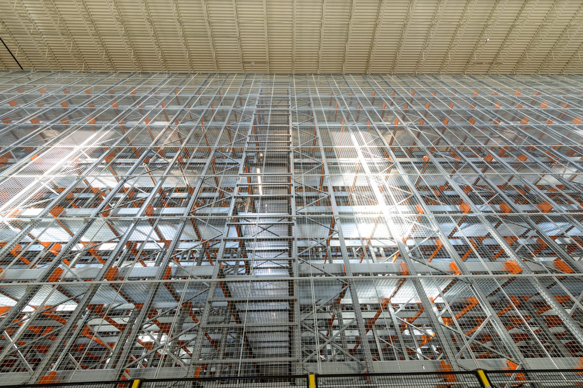 The full height of the automated storage structure rising to the roofline